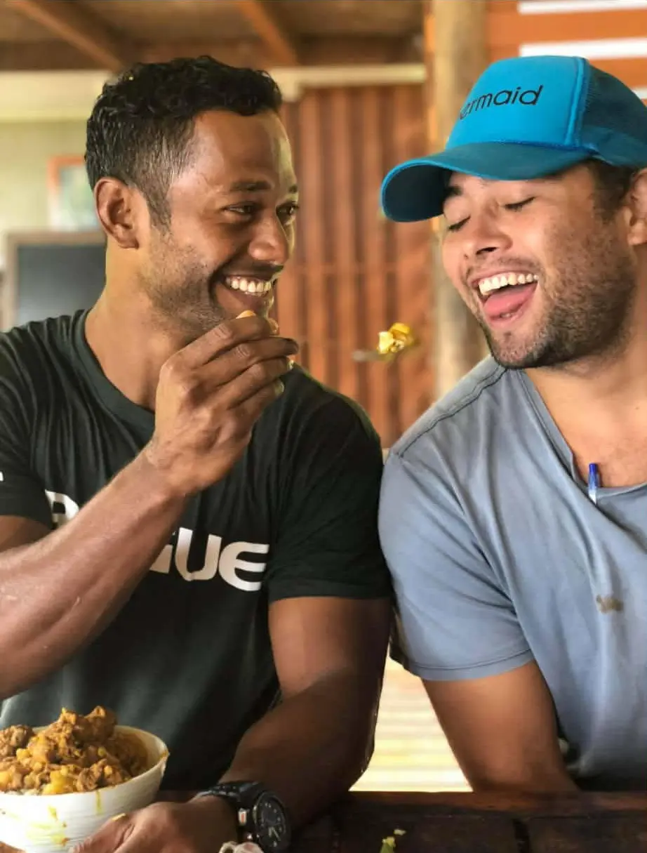 Beachouse couple sharing meal