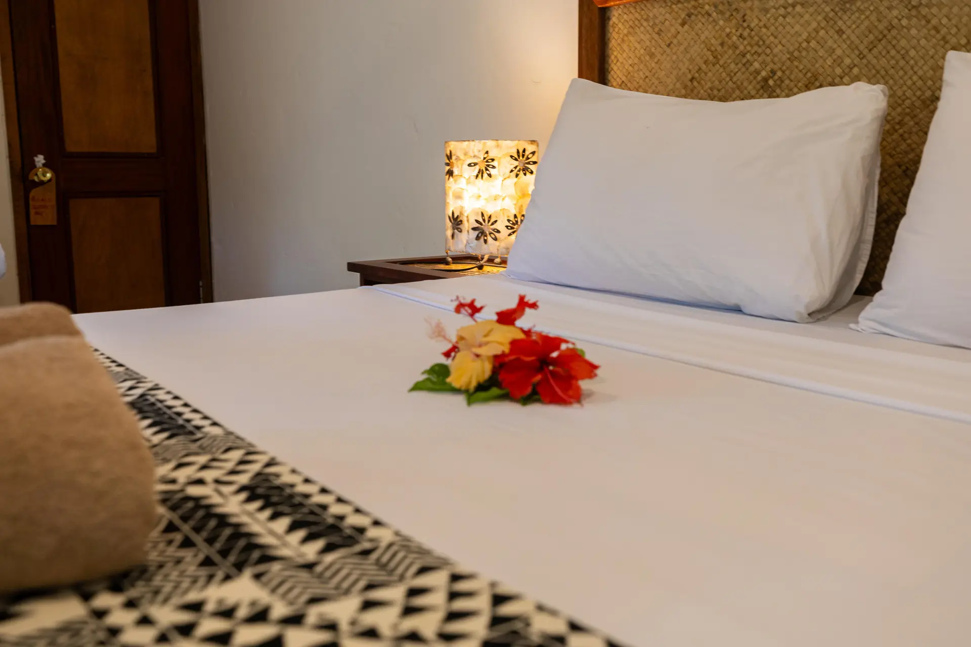 Bed detail with tropical flowers